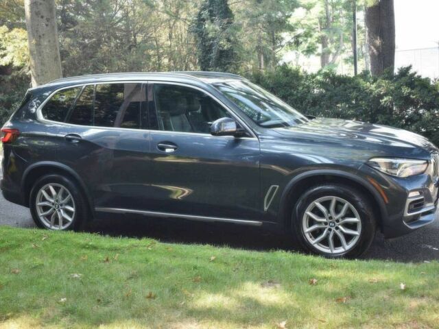 Синий БМВ Х5, объемом двигателя 3 л и пробегом 32 тыс. км за 24300 $, фото 1 на Automoto.ua