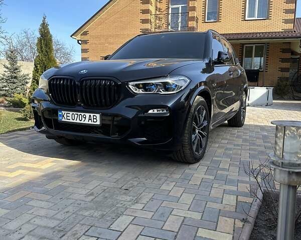Синий БМВ Х5, объемом двигателя 3 л и пробегом 52 тыс. км за 76500 $, фото 1 на Automoto.ua