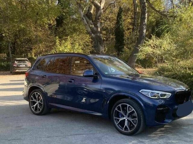 Синий БМВ Х5, объемом двигателя 3 л и пробегом 56 тыс. км за 32100 $, фото 1 на Automoto.ua
