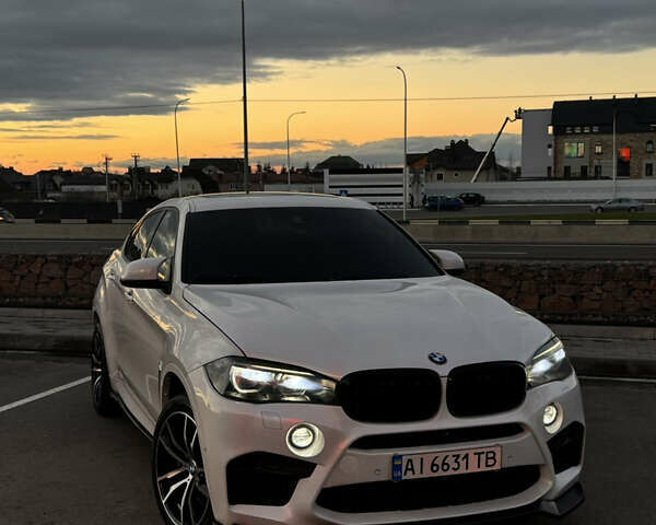 Белый БМВ Х6 М, объемом двигателя 4.39 л и пробегом 157 тыс. км за 35800 $, фото 1 на Automoto.ua