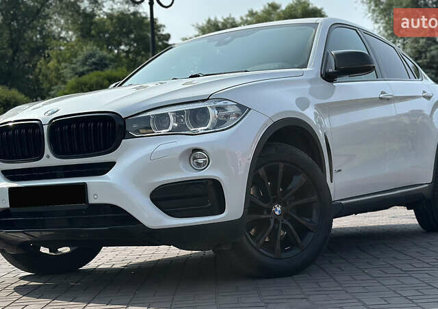 Белый БМВ Х6, объемом двигателя 3 л и пробегом 157 тыс. км за 28500 $, фото 1 на Automoto.ua