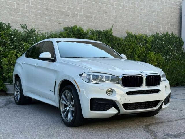 Белый БМВ Х6, объемом двигателя 3 л и пробегом 78 тыс. км за 12000 $, фото 1 на Automoto.ua
