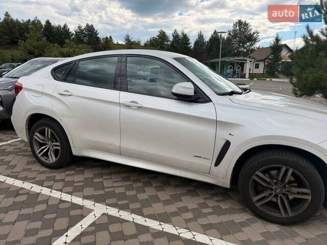 Белый БМВ Х6, объемом двигателя 3 л и пробегом 111 тыс. км за 44400 $, фото 1 на Automoto.ua