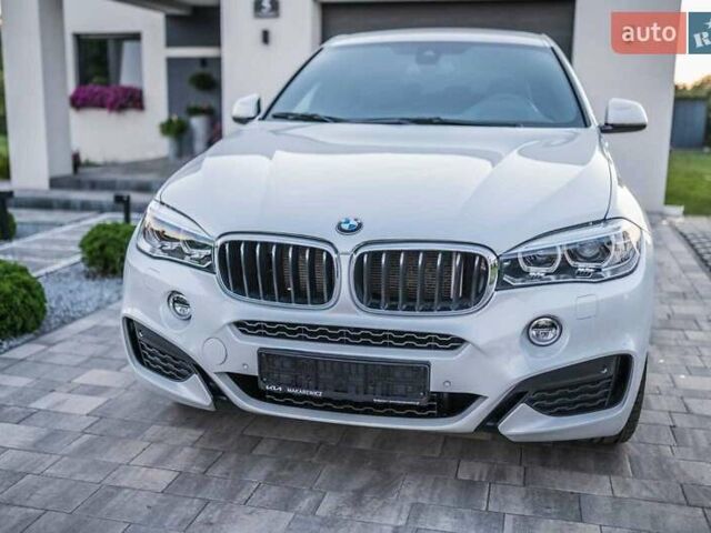 Белый БМВ Х6, объемом двигателя 3 л и пробегом 300 тыс. км за 33549 $, фото 1 на Automoto.ua