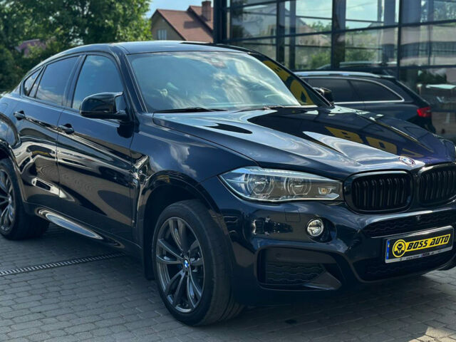 Черный БМВ Х6, объемом двигателя 3 л и пробегом 130 тыс. км за 39990 $, фото 1 на Automoto.ua