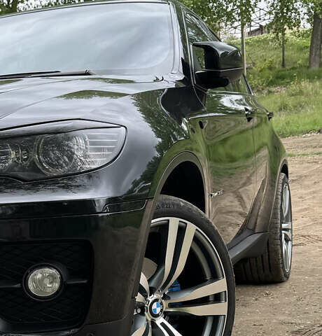 Черный БМВ Х6, объемом двигателя 3 л и пробегом 189 тыс. км за 16500 $, фото 1 на Automoto.ua