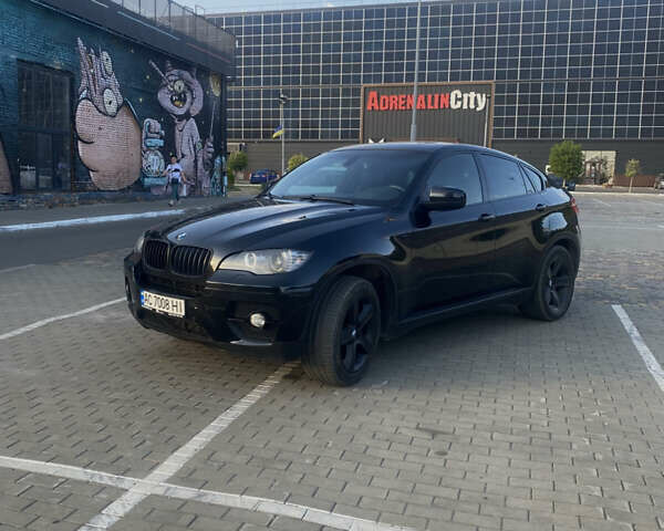 Чорний БМВ Х6, об'ємом двигуна 3 л та пробігом 235 тис. км за 13700 $, фото 1 на Automoto.ua