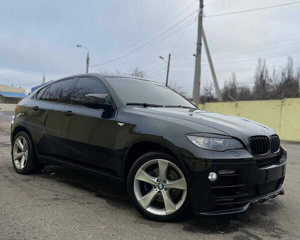 Черный БМВ Х6, объемом двигателя 4.39 л и пробегом 240 тыс. км за 15900 $, фото 1 на Automoto.ua