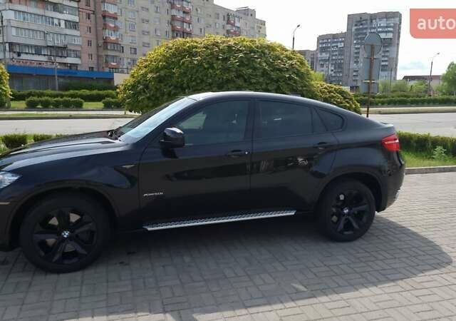 Черный БМВ Х6, объемом двигателя 4.4 л и пробегом 150 тыс. км за 20000 $, фото 1 на Automoto.ua