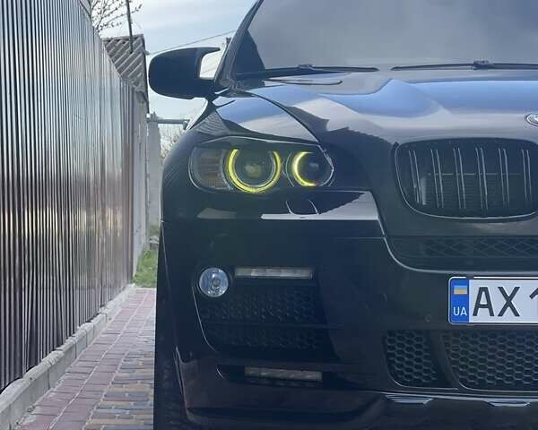 Черный БМВ Х6, объемом двигателя 4.4 л и пробегом 230 тыс. км за 16800 $, фото 1 на Automoto.ua