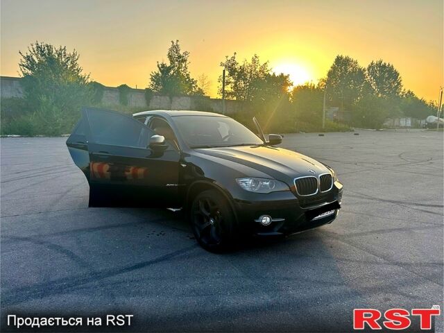 Чорний БМВ Х6, об'ємом двигуна 3 л та пробігом 300 тис. км за 15600 $, фото 1 на Automoto.ua