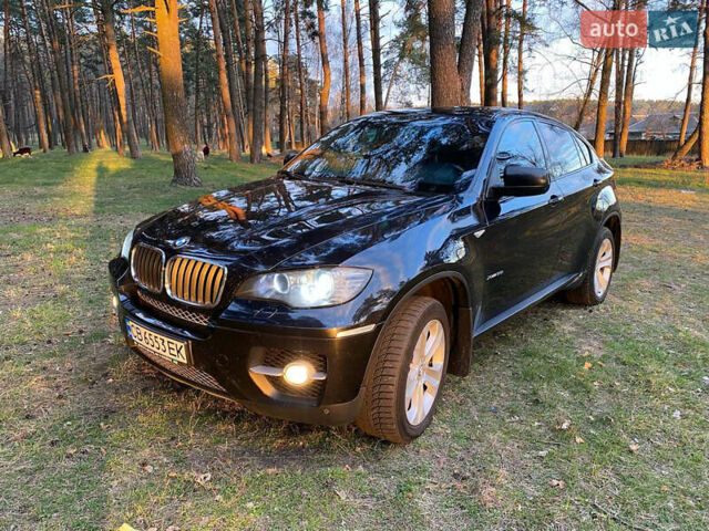 Черный БМВ Х6, объемом двигателя 3 л и пробегом 295 тыс. км за 12800 $, фото 1 на Automoto.ua