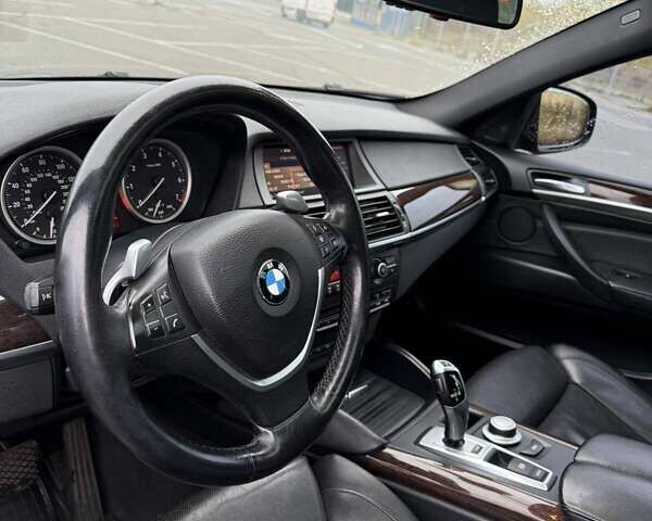 Черный БМВ Х6, объемом двигателя 4.4 л и пробегом 215 тыс. км за 12500 $, фото 1 на Automoto.ua