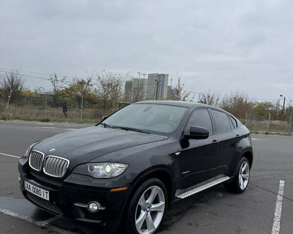 Черный БМВ Х6, объемом двигателя 4.4 л и пробегом 215 тыс. км за 15000 $, фото 1 на Automoto.ua
