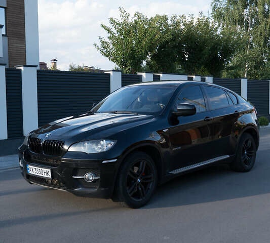 Черный БМВ Х6, объемом двигателя 3 л и пробегом 312 тыс. км за 16500 $, фото 1 на Automoto.ua