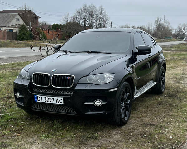 Черный БМВ Х6, объемом двигателя 3 л и пробегом 189 тыс. км за 13200 $, фото 1 на Automoto.ua