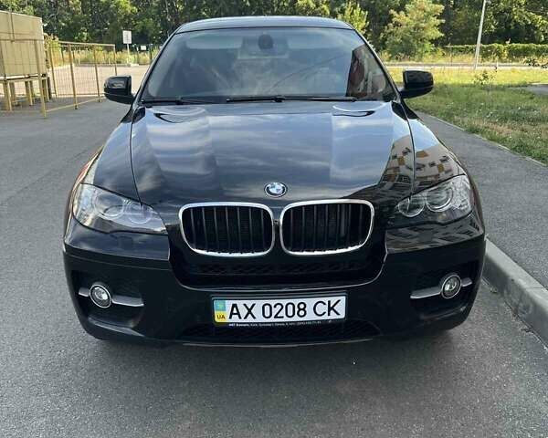 Черный БМВ Х6, объемом двигателя 3 л и пробегом 117 тыс. км за 19200 $, фото 1 на Automoto.ua