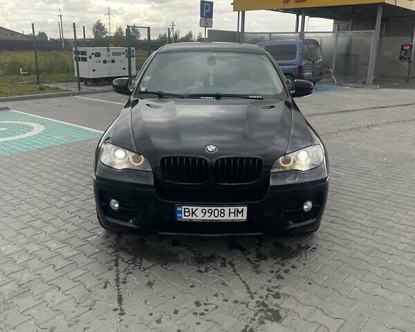 Черный БМВ Х6, объемом двигателя 3 л и пробегом 210 тыс. км за 19800 $, фото 1 на Automoto.ua