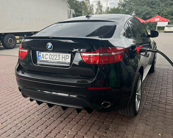 Чорний БМВ Х6, об'ємом двигуна 3 л та пробігом 310 тис. км за 20000 $, фото 1 на Automoto.ua