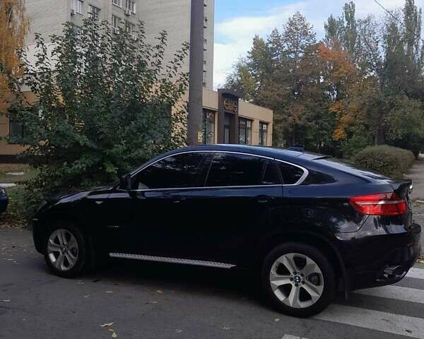 Черный БМВ Х6, объемом двигателя 3 л и пробегом 92 тыс. км за 21000 $, фото 1 на Automoto.ua