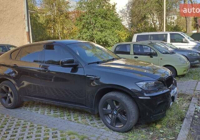 Черный БМВ Х6, объемом двигателя 4.4 л и пробегом 167 тыс. км за 19999 $, фото 1 на Automoto.ua