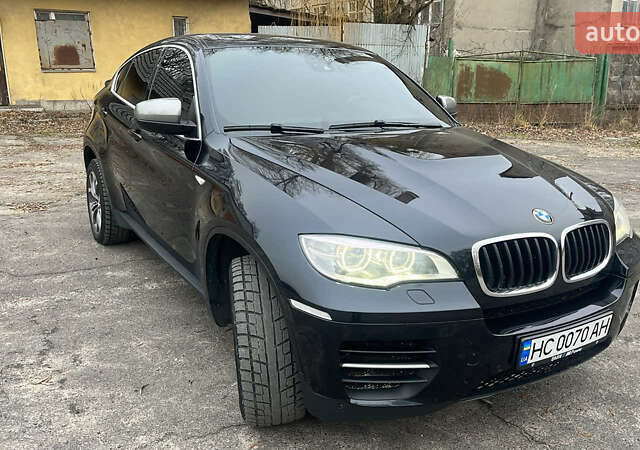 Чорний БМВ Х6, об'ємом двигуна 2.99 л та пробігом 222 тис. км за 28900 $, фото 1 на Automoto.ua