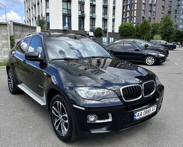 Черный БМВ Х6, объемом двигателя 3 л и пробегом 140 тыс. км за 23000 $, фото 1 на Automoto.ua
