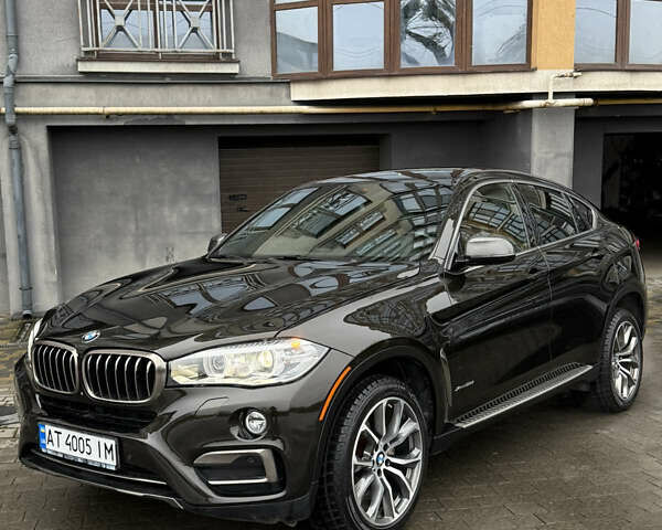 Черный БМВ Х6, объемом двигателя 3 л и пробегом 80 тыс. км за 35500 $, фото 1 на Automoto.ua