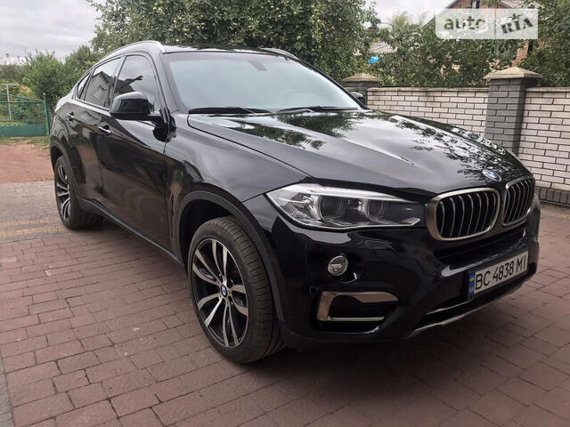 Черный БМВ Х6, объемом двигателя 3 л и пробегом 130 тыс. км за 32500 $, фото 1 на Automoto.ua