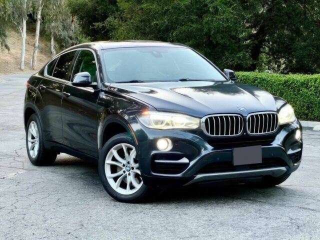 Черный БМВ Х6, объемом двигателя 4.4 л и пробегом 80 тыс. км за 16700 $, фото 1 на Automoto.ua