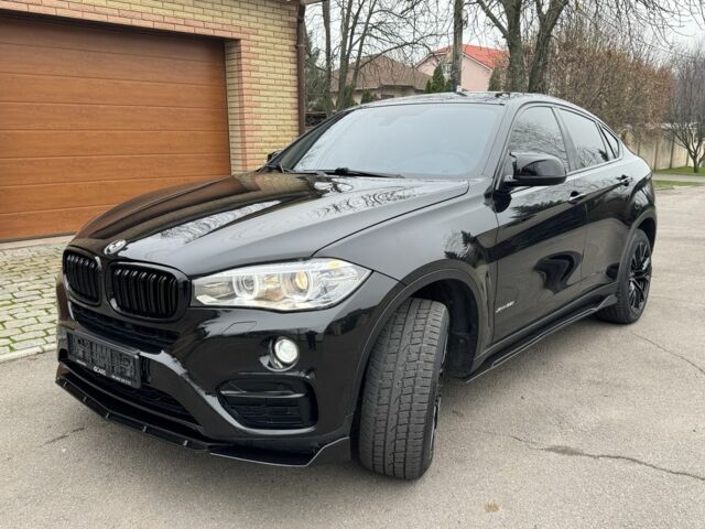 Черный БМВ Х6, объемом двигателя 3 л и пробегом 160 тыс. км за 25600 $, фото 1 на Automoto.ua