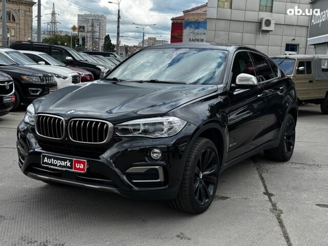 Чорний БМВ Х6, об'ємом двигуна 3 л та пробігом 144 тис. км за 28990 $, фото 1 на Automoto.ua