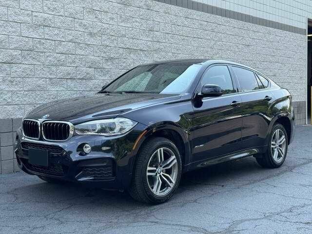 Черный БМВ Х6, объемом двигателя 3 л и пробегом 47 тыс. км за 8900 $, фото 1 на Automoto.ua