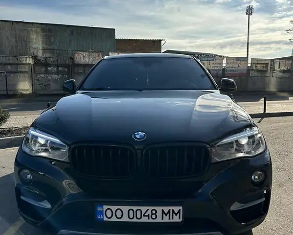 Черный БМВ Х6, объемом двигателя 3 л и пробегом 205 тыс. км за 38500 $, фото 1 на Automoto.ua