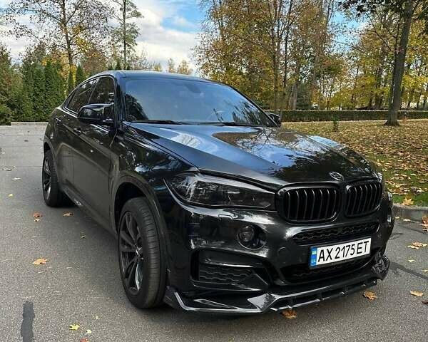 Чорний БМВ Х6, об'ємом двигуна 2.99 л та пробігом 184 тис. км за 41000 $, фото 1 на Automoto.ua