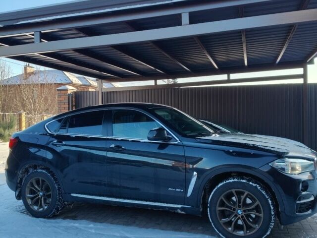 Чорний БМВ Х6, об'ємом двигуна 3 л та пробігом 154 тис. км за 39500 $, фото 1 на Automoto.ua