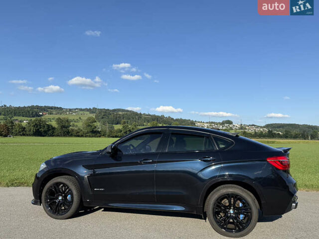 Чорний БМВ Х6, об'ємом двигуна 3 л та пробігом 173 тис. км за 38900 $, фото 1 на Automoto.ua