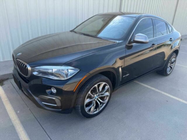 Черный БМВ Х6, объемом двигателя 4.4 л и пробегом 61 тыс. км за 15600 $, фото 1 на Automoto.ua