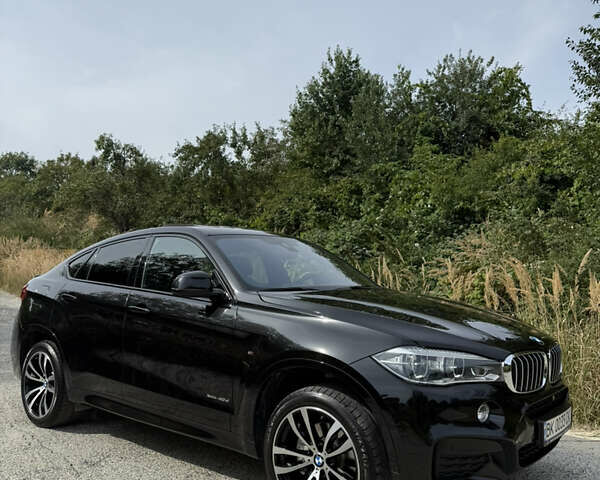 Чорний БМВ Х6, об'ємом двигуна 2.99 л та пробігом 143 тис. км за 40700 $, фото 1 на Automoto.ua