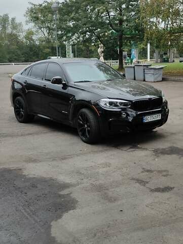 Черный БМВ Х6, объемом двигателя 2.98 л и пробегом 205 тыс. км за 28999 $, фото 1 на Automoto.ua