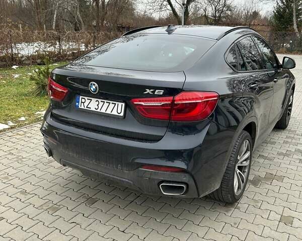 Чорний БМВ Х6, об'ємом двигуна 2.99 л та пробігом 66 тис. км за 39900 $, фото 1 на Automoto.ua