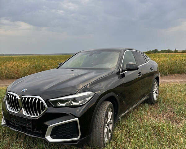 Черный БМВ Х6, объемом двигателя 3 л и пробегом 65 тыс. км за 73800 $, фото 1 на Automoto.ua