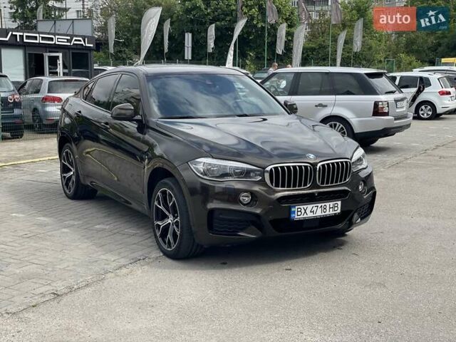 Коричневый БМВ Х6, объемом двигателя 2.99 л и пробегом 134 тыс. км за 35500 $, фото 1 на Automoto.ua