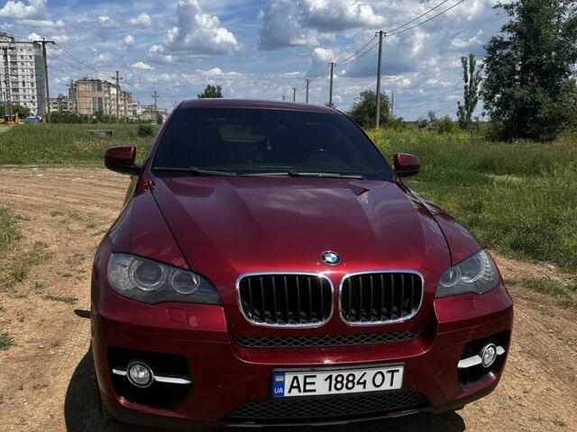 Красный БМВ Х6, объемом двигателя 3 л и пробегом 200 тыс. км за 14000 $, фото 1 на Automoto.ua
