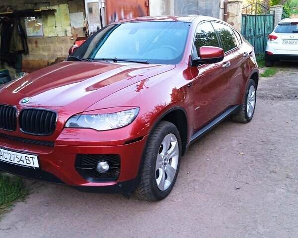 Красный БМВ Х6, объемом двигателя 3 л и пробегом 207 тыс. км за 15000 $, фото 1 на Automoto.ua