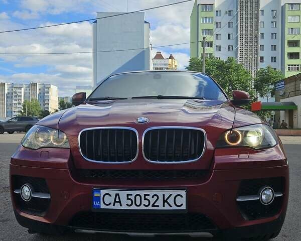 Красный БМВ Х6, объемом двигателя 3.5 л и пробегом 231 тыс. км за 15500 $, фото 1 на Automoto.ua