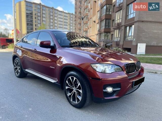 Красный БМВ Х6, объемом двигателя 3 л и пробегом 187 тыс. км за 12999 $, фото 1 на Automoto.ua