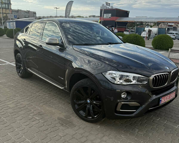 Серый БМВ Х6, объемом двигателя 3 л и пробегом 100 тыс. км за 32999 $, фото 1 на Automoto.ua