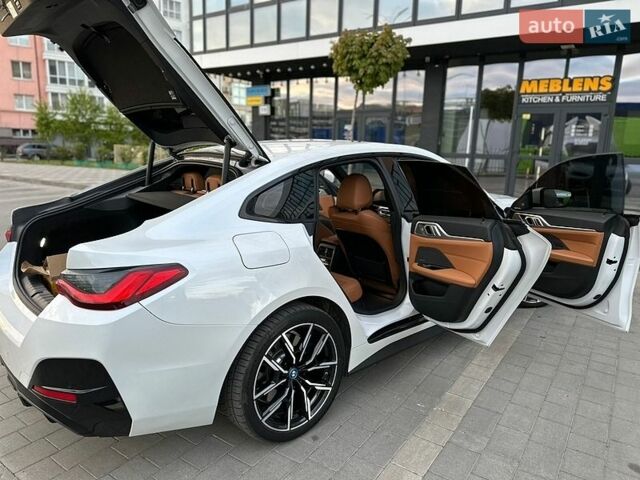 Белый БМВ i4, объемом двигателя 0 л и пробегом 53 тыс. км за 29900 $, фото 1 на Automoto.ua