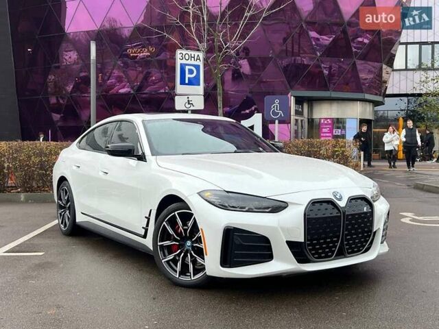 Белый БМВ i4, объемом двигателя 0 л и пробегом 20 тыс. км за 32990 $, фото 1 на Automoto.ua